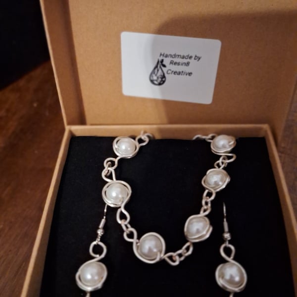 Silver wire wrapped pearl bead bracelet and matching earrings