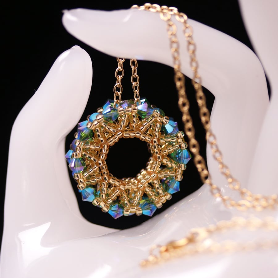 Green and Gold Beaded Wheel Pendant