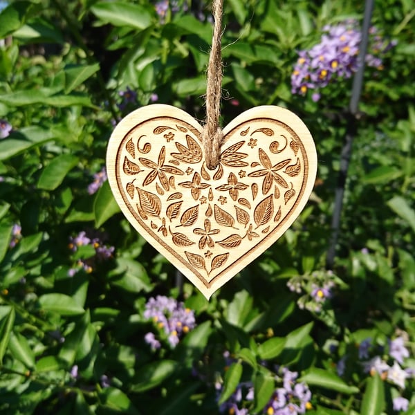 Folk art flower heart, hand drawn, laser etched and cut into wood