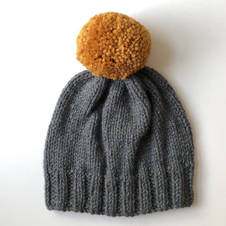 Bobble Hat in Grey Chunky Yarn with Mustard Pom Pom