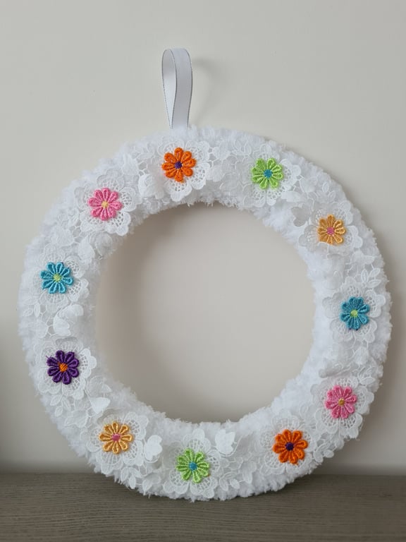 Soft white yarn wrapped wreath