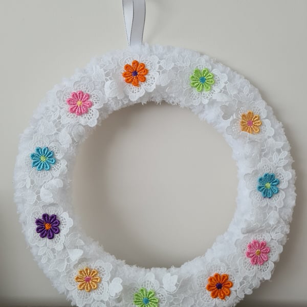 Soft white yarn wrapped wreath
