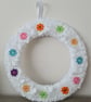 Soft white yarn wrapped wreath