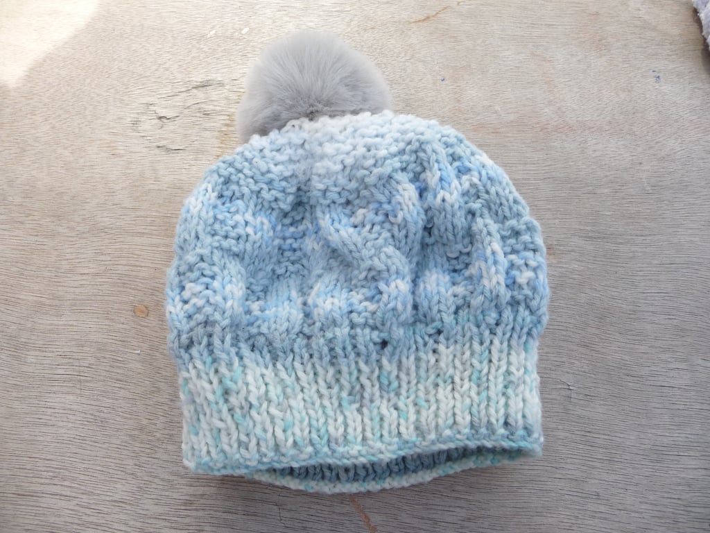 Bobble hat blue and white yarn faux fur pompom baby accessories.