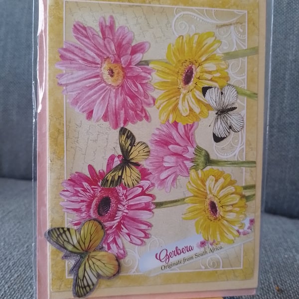 Gerberas with a butterfly ambelishmens