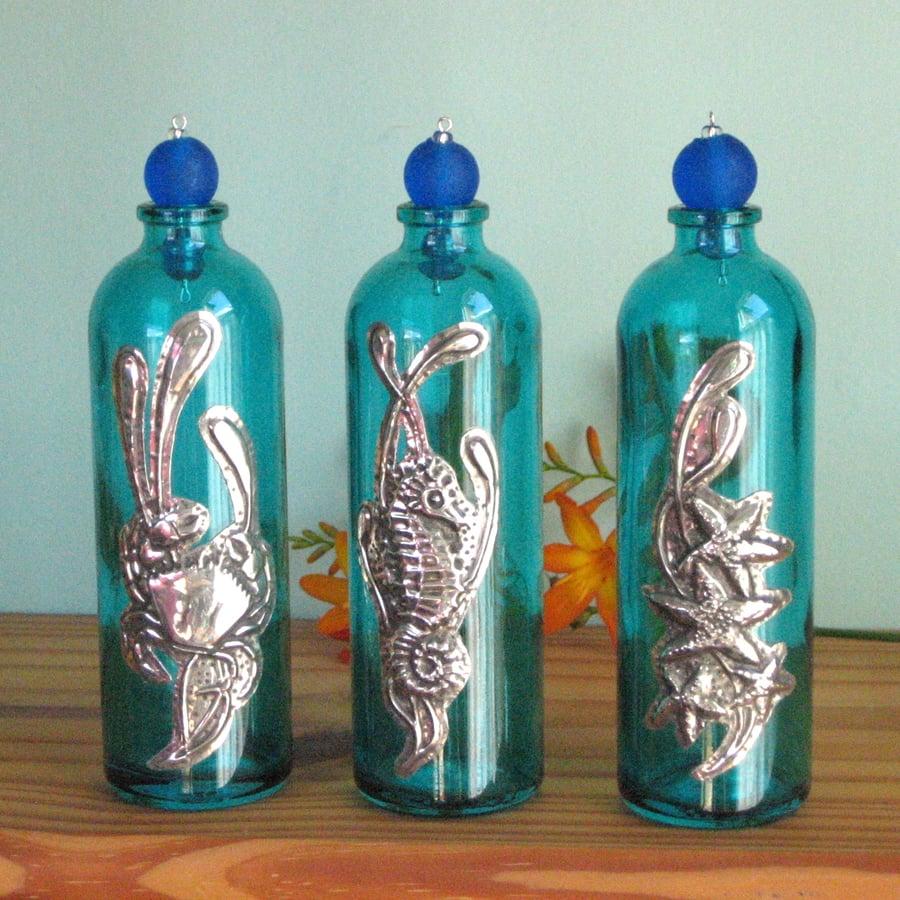 Trio of Glass Bottle Vases with Crab, Starfish and Seahorse in Silver Metal