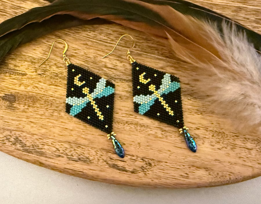 Bead woven dragonfly earrings in turquoise black and gold with a Czech teardrop 