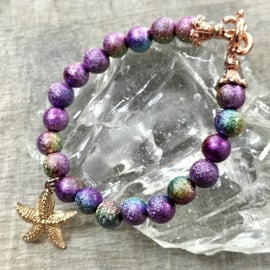 Purple rainbow miracle bead bracelet with starfish