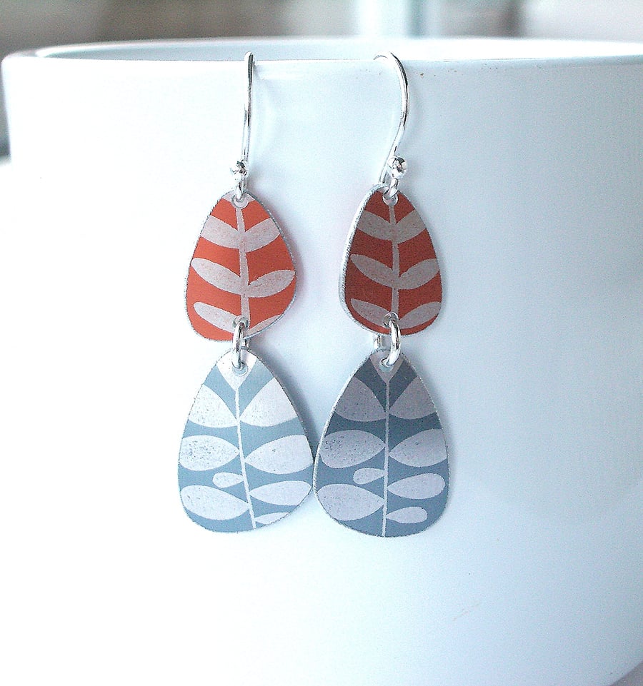 Pebble shaped mid century style orange drop earrings