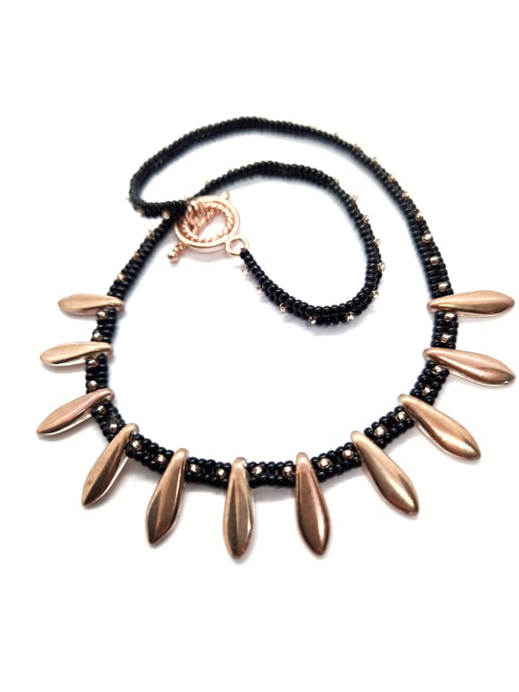 Sleek black and rose gold glittering beaded necklace