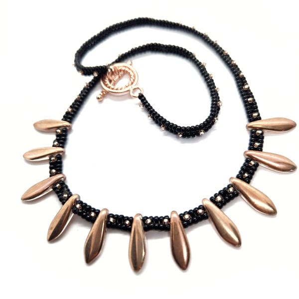 Sleek black and rose gold glittering beaded necklace