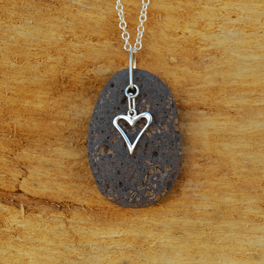 Volcanic pebble with sterling silver heart
