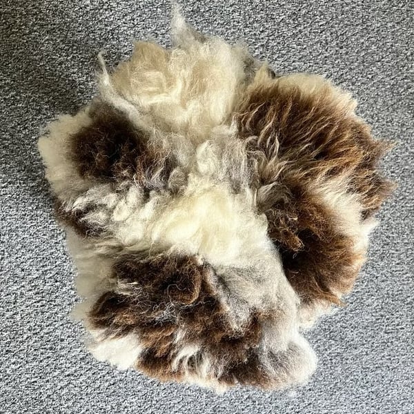 Natural wool felted seat-pad and or a mat for a cat or a small dog  