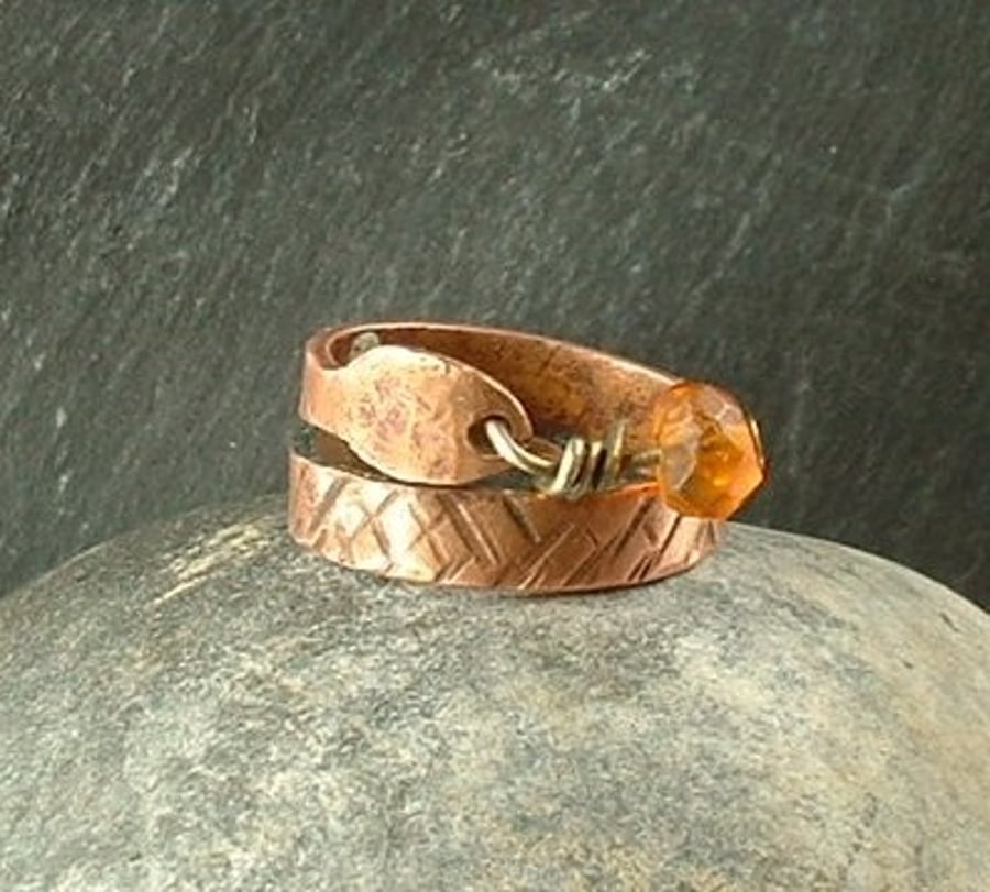 "Sleeping Serpent" Rustic copper ring with amber fidget bead