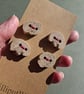 Set of Four Beachcombed Buttons - Image 1