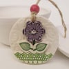 Ceramic decoration with flower button