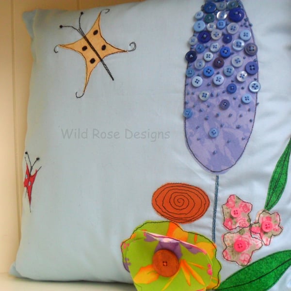 Cushion 'Flowers and butterflies' . 