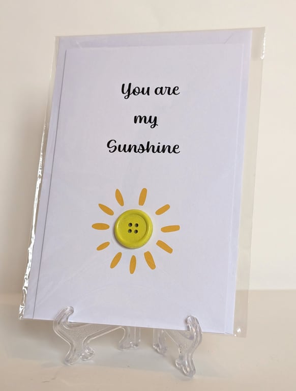 "You are my sunshine" greetings card with a yellow button sun