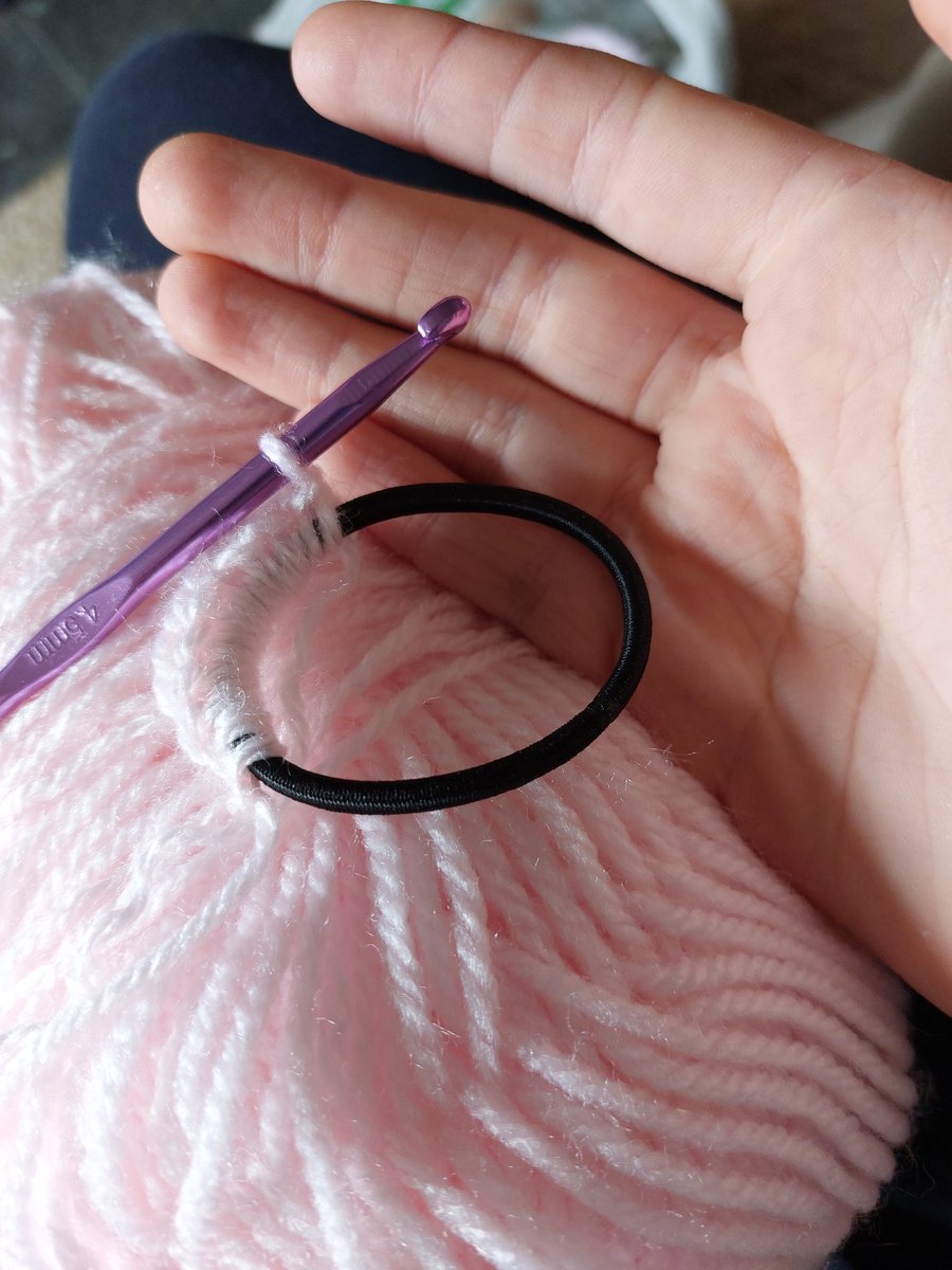 Pale pink crochet scrunchie