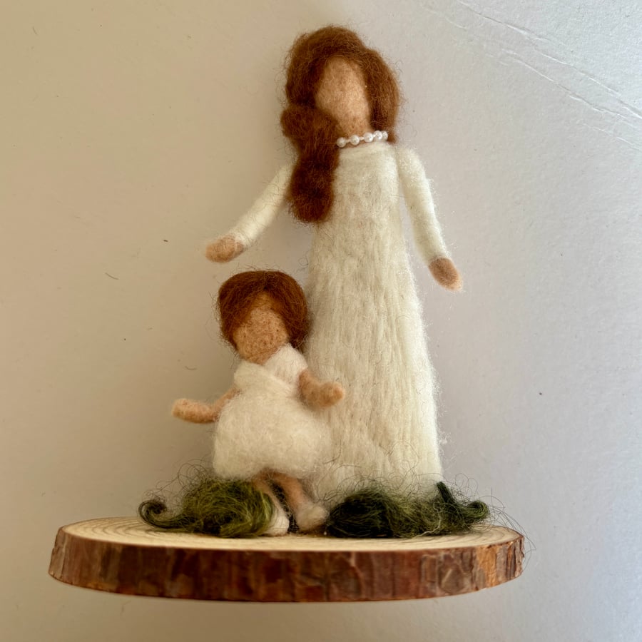 White needlefelted wool woman and child ornament