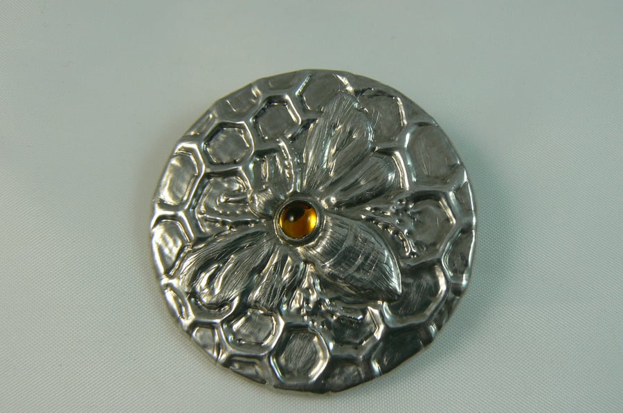 Pewter brooch ( honey bee on honeycomb)
