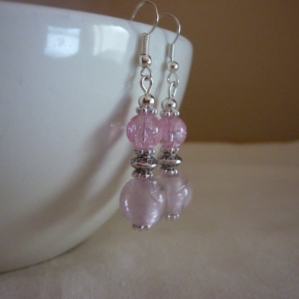 PINK AND SILVER GLASS BEAD DANGLE EARRINGS.