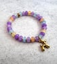 Glass bead charm bracelet
