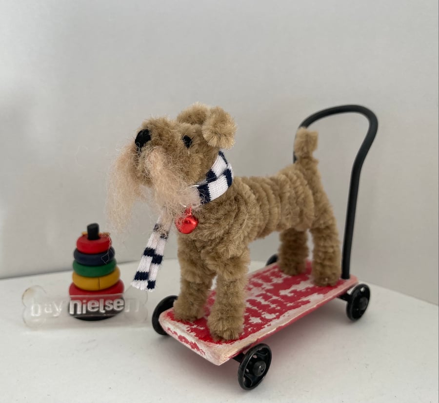 Miniature Handmade Dog on a Push Along Trolley. 