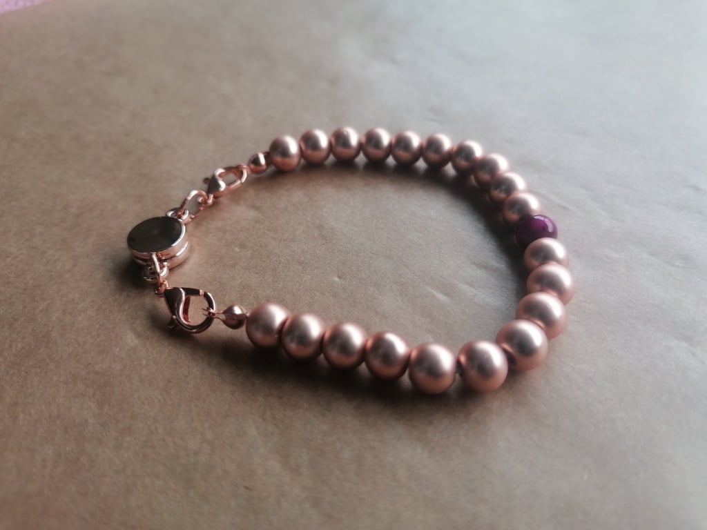 Rose gold ball bracelet, hot pink stone, magnetic clasp. 