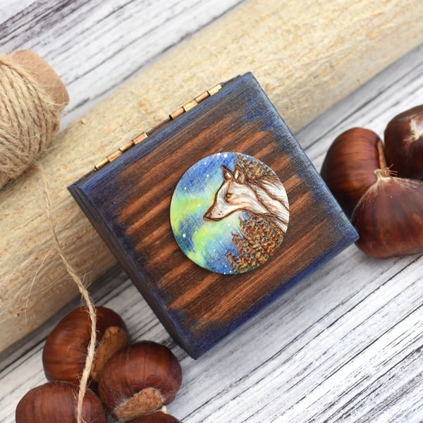 Wolf watching the aurora. Tiny pyrography box. Original art.