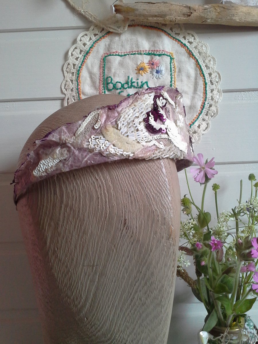 textile and paper ,pinky , purple tiara