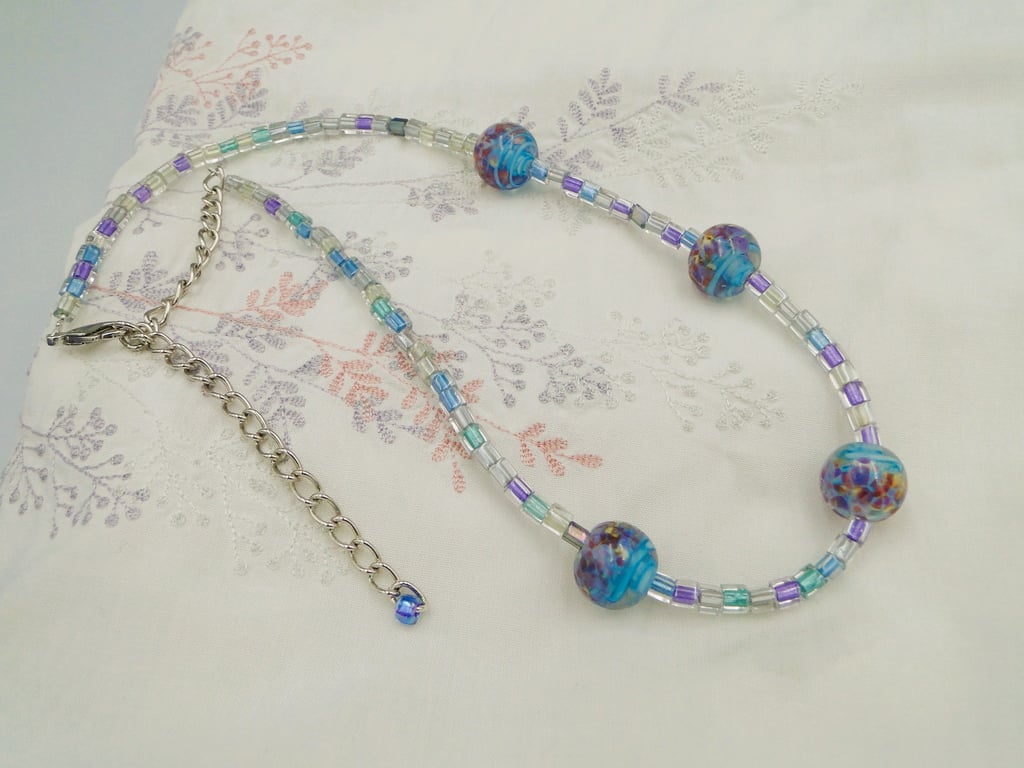 Necklace with lilac blue purple handmade glass beads