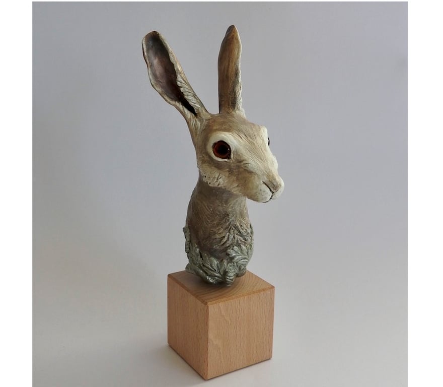 Unique hand crafted Sculpture of a Hare fixed on a wooden plinth