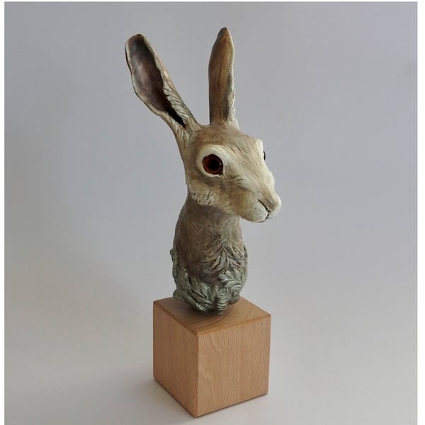Unique hand crafted Sculpture of a Hare fixed on a wooden plinth