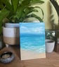 Seascape finger painting with sand texture