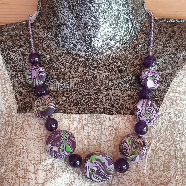 Purple, lilac, green and white polymer clay disc necklace