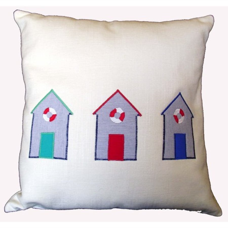 Applique cushion with beach huts  