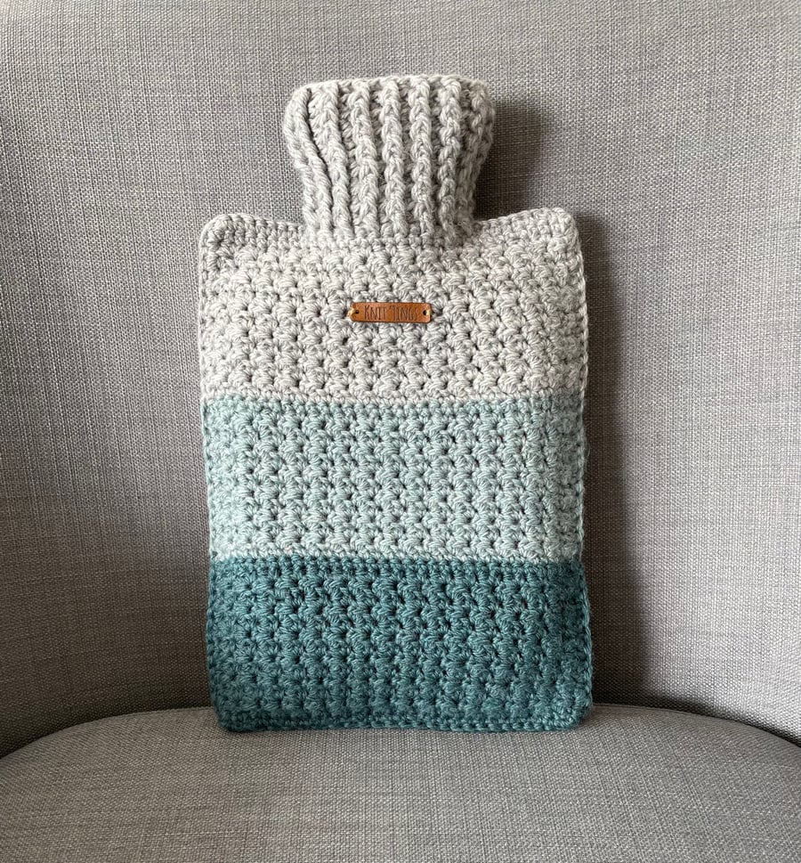 Wool hot water bottle cover. Colour block crochet hot water bottle cosy.