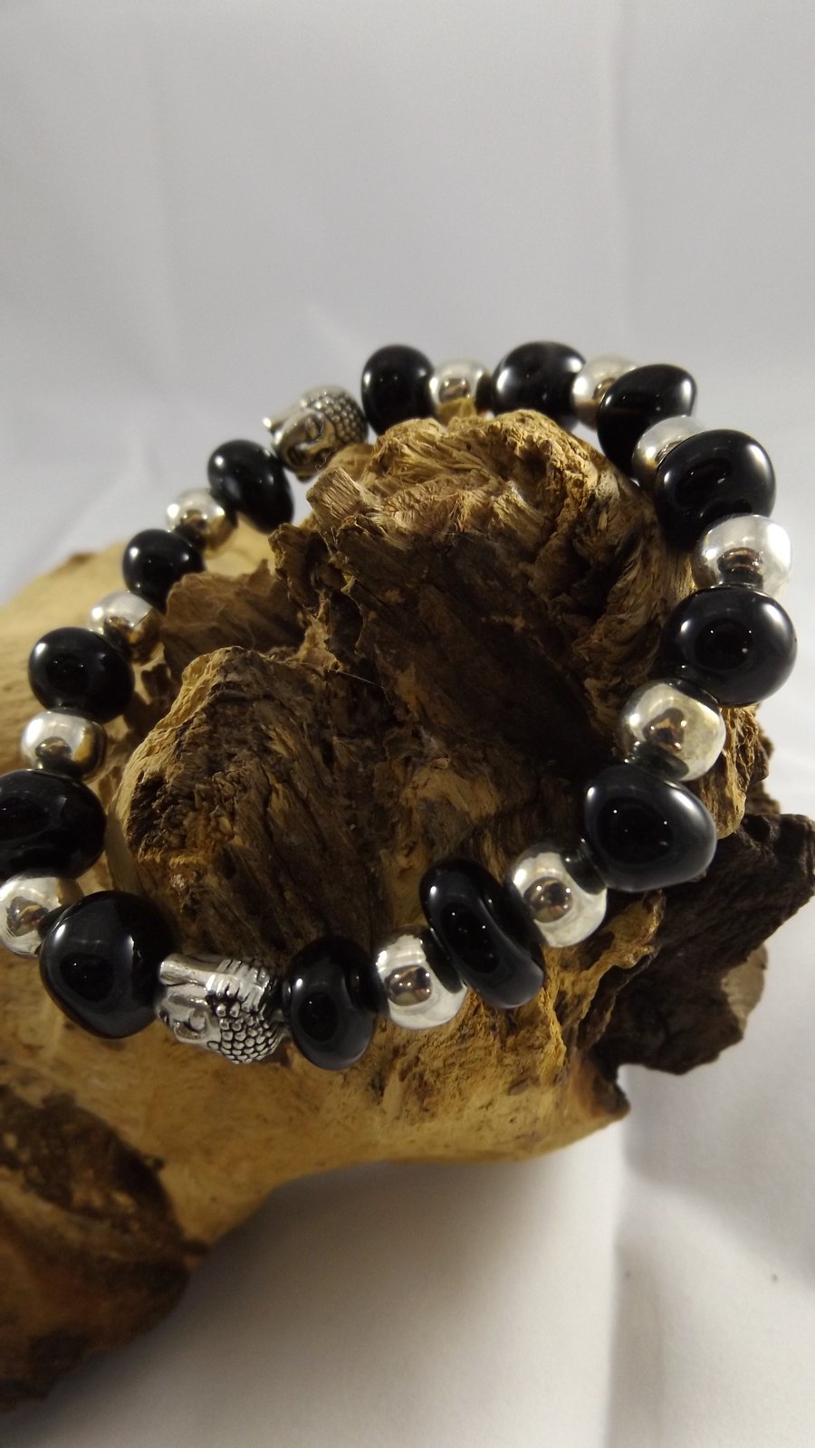 Black agate and silver plated buddha head stretch bracelet