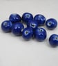 10 Small Cobalt Blue Glazed Clay Beads - Image 1