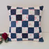 Denim and floral patchwork cushion in reclaimed vintage fabric 1970s inspired