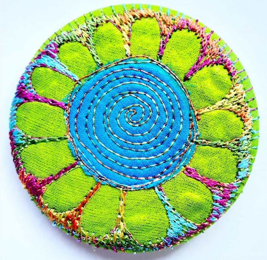 58mm Fabric Badge with Free Machine Embroidery Blue Flower 