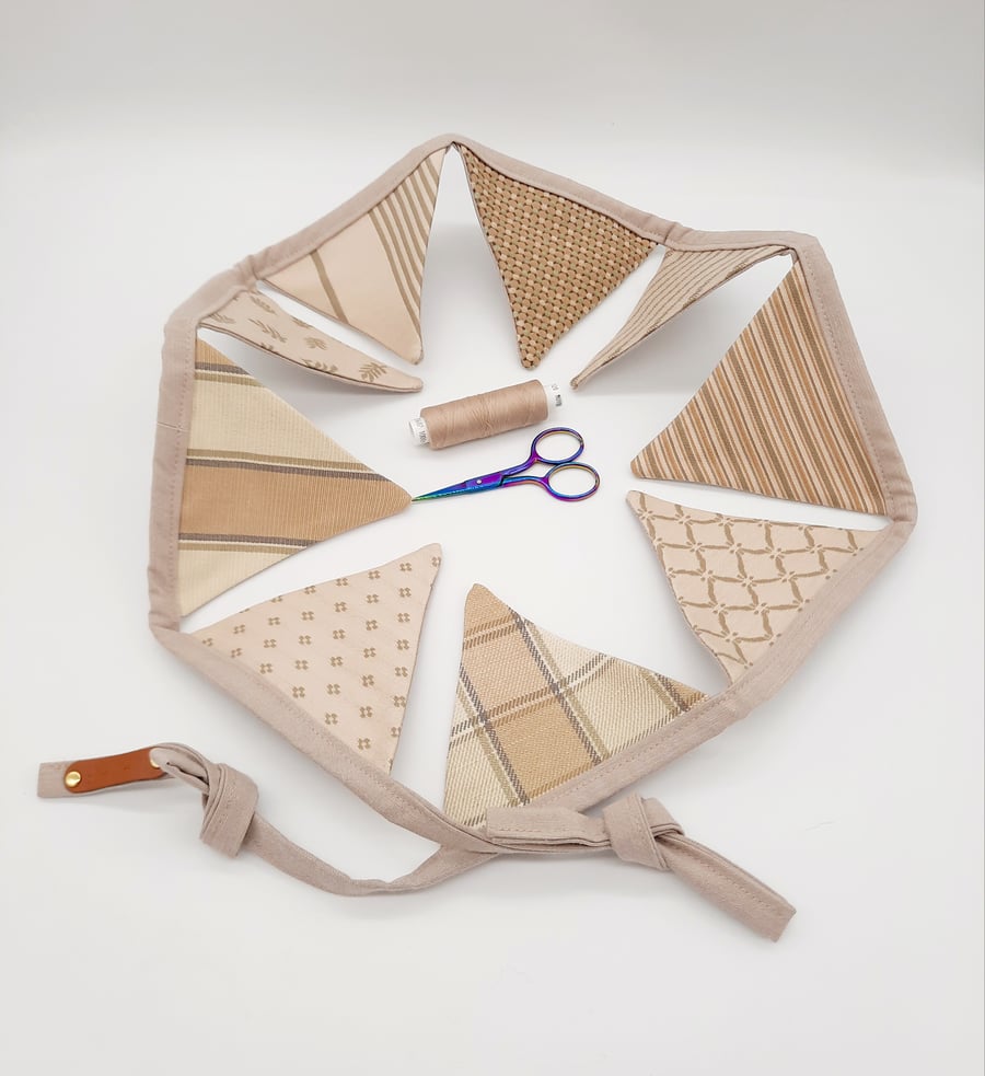 Fabric bunting,  cream and tan home decoration.  