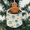 Ceramic Christmas decoration gingerbread man in a mug