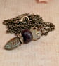 Green glass leaf and maroon and gold beads pendant with antique gold chain 