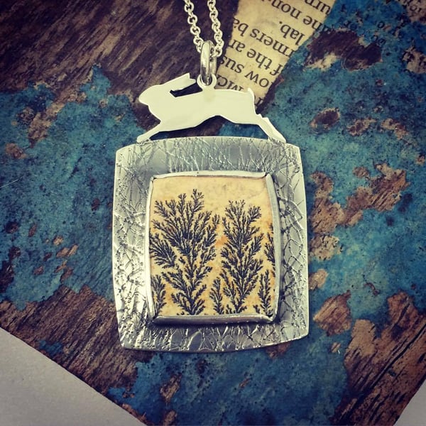 Leaping hare and sand stone meadow pendant