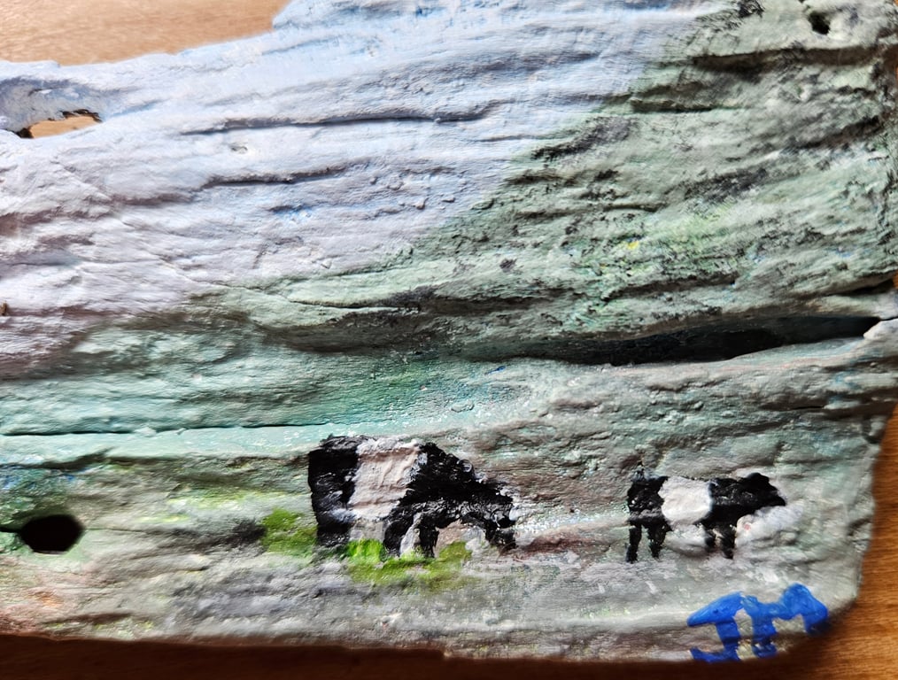 Highland  croft painting on driftwood . 