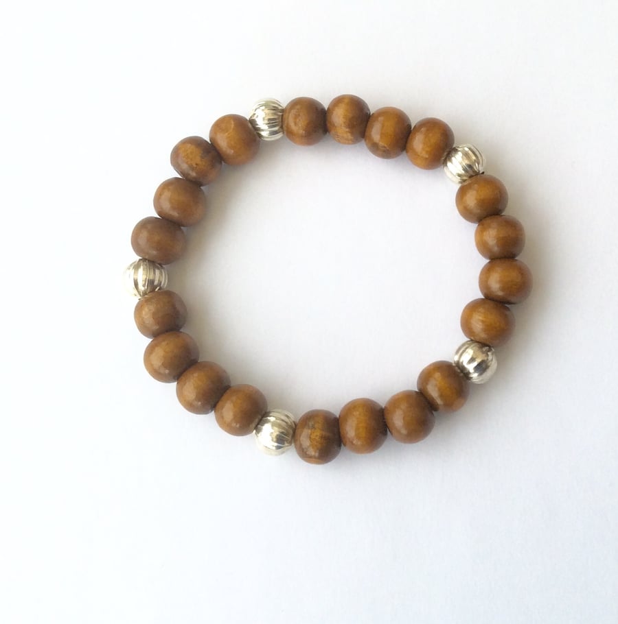 Brown wooden bracelet with Tibetan silver melon spacer beads