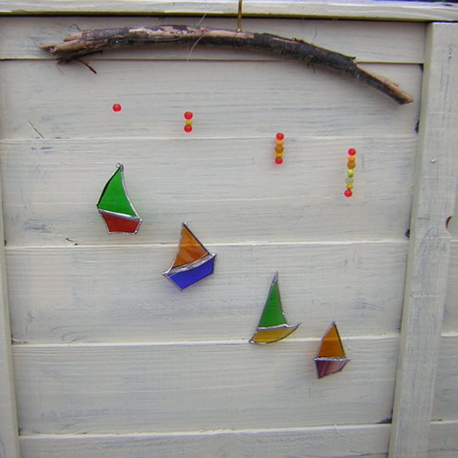 stained glass and driftwood boat mobile
