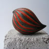 Baby carved bird, raku